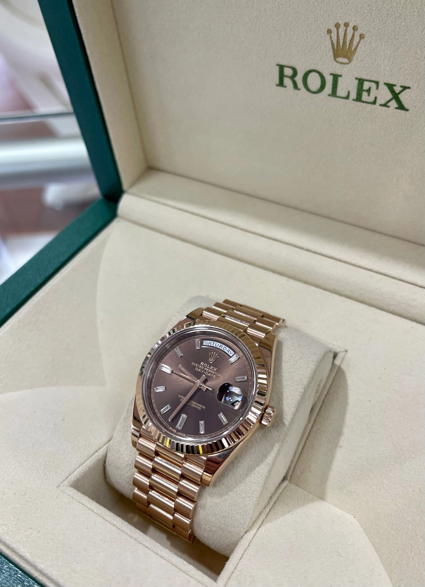 PreOwned Rolex Day-Date 40mm Everrose Gold 228235 Factory Chocolate Baguette Dial Box/Papers