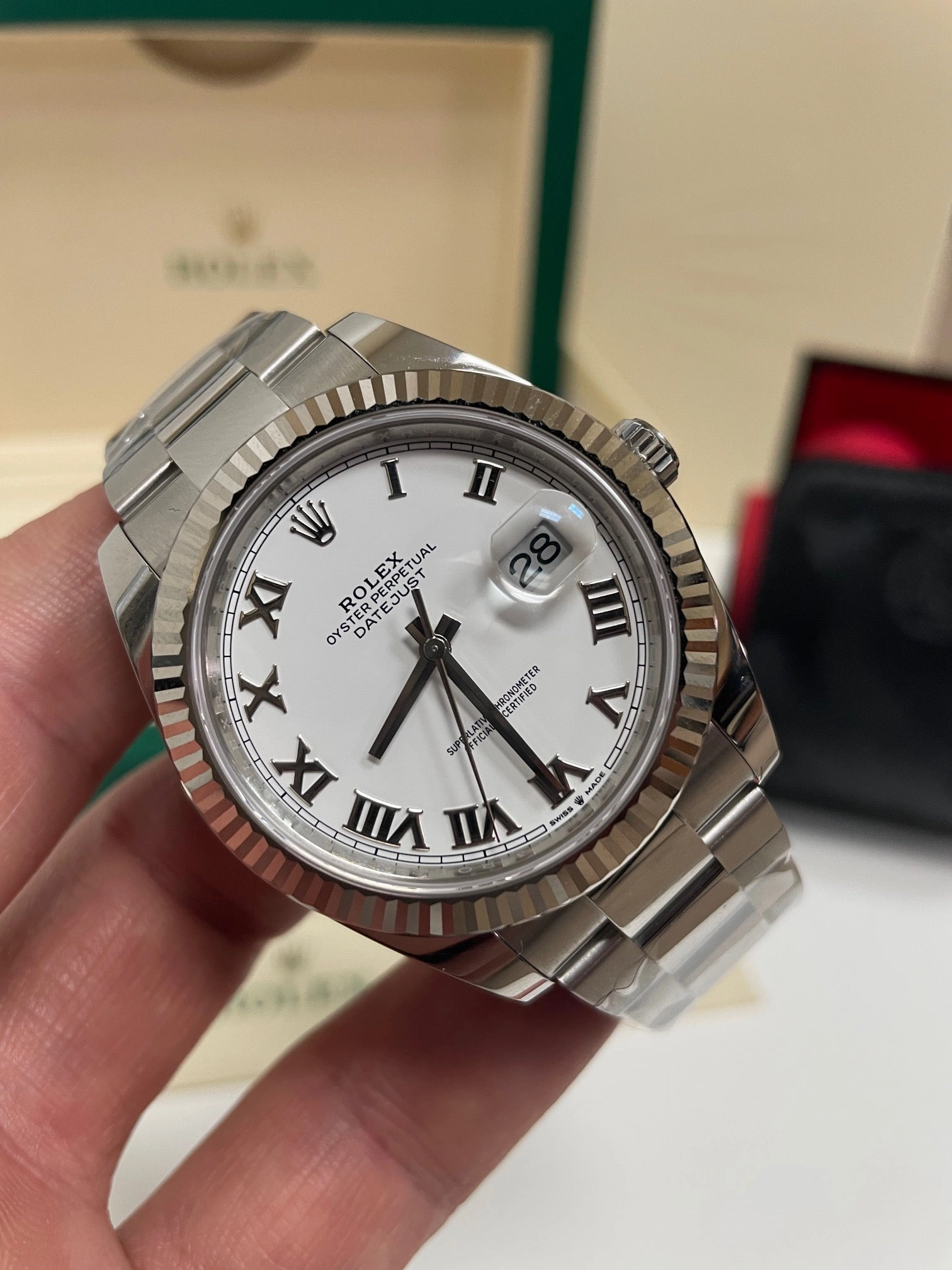 Rolex Datejust 41mm 126334 White Roman Dial White gold Fluted bezel Box and Papers Unworn