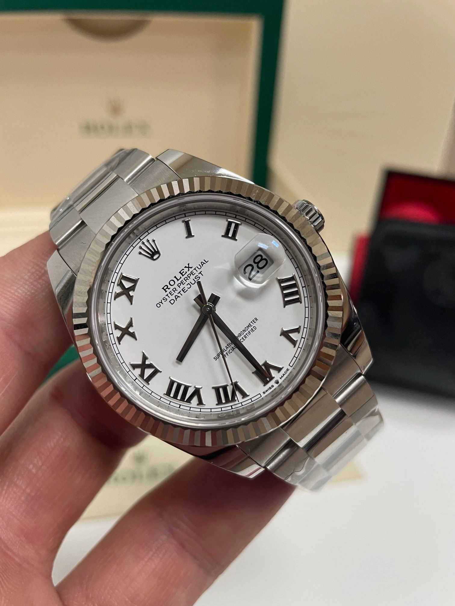 Rolex Datejust 41mm 126334 White Roman Dial White gold Fluted bezel Box and Papers Unworn