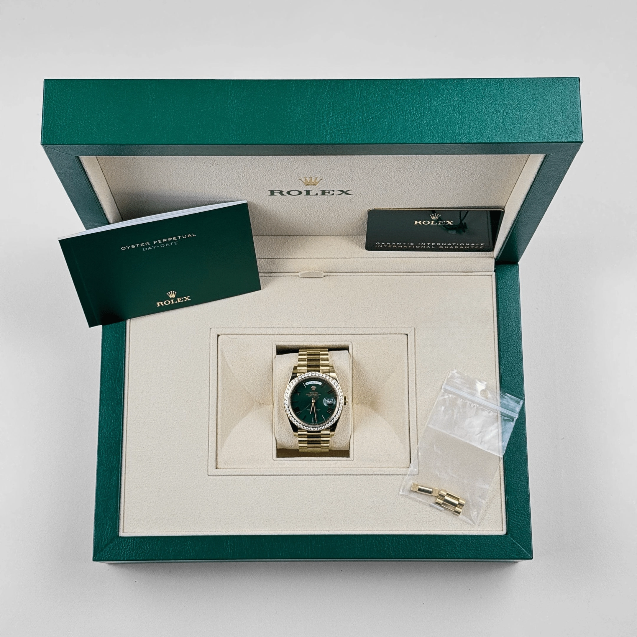 Rolex Day-Date 40 228348RBR Yellow Gold Green Roman Numeral Dial Diamond Bezel (2024)