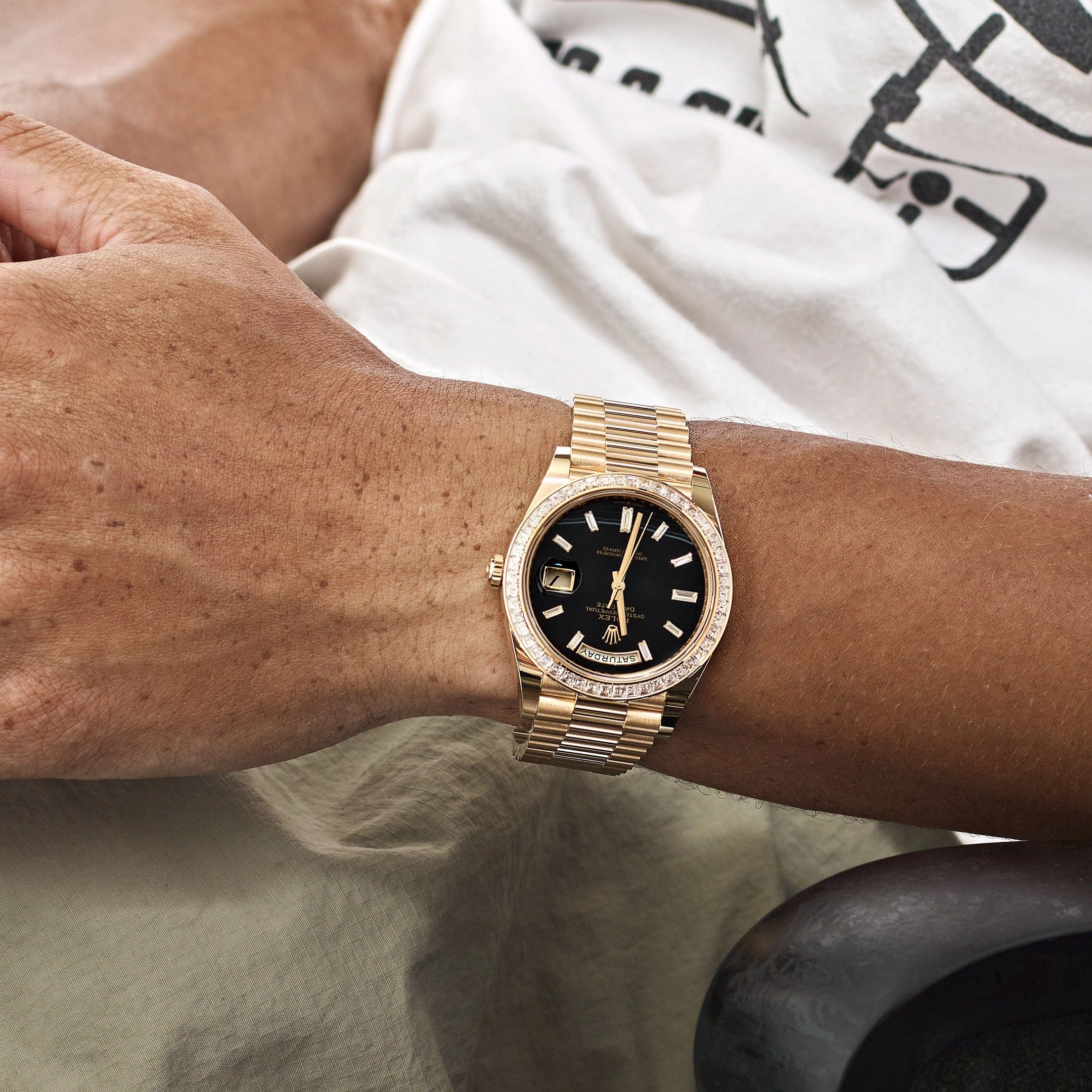 Rolex Day-Date 40 228398TBR Yellow Gold Onyx Baguette Diamond Dial Baguette Bezel (2023)