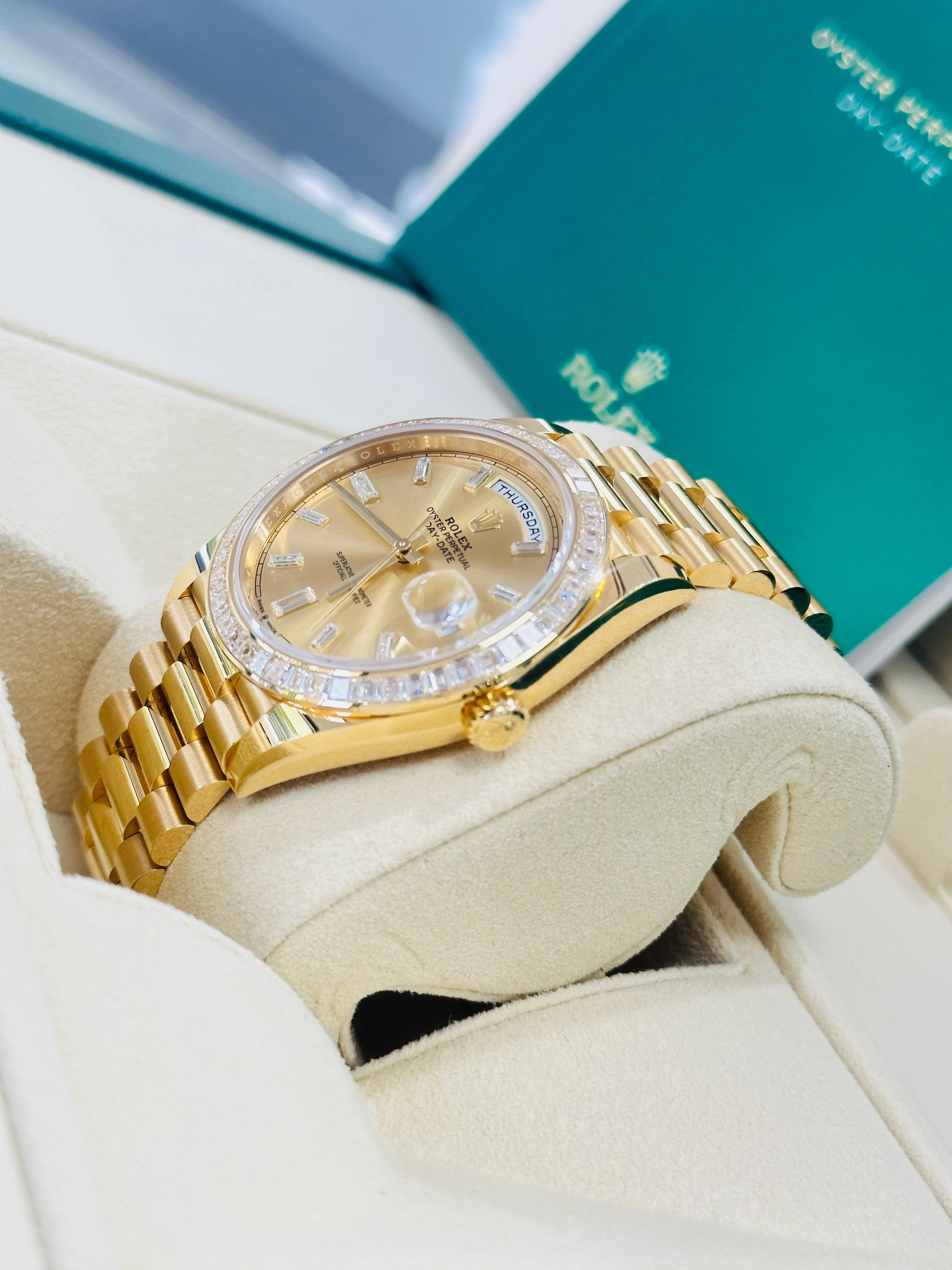 Rolex Day-Date 40 Yellow Gold Baguette Yellow gold Bezel  Factory Baguette Diamond Champagne Dial 228398TBR Box and Papers