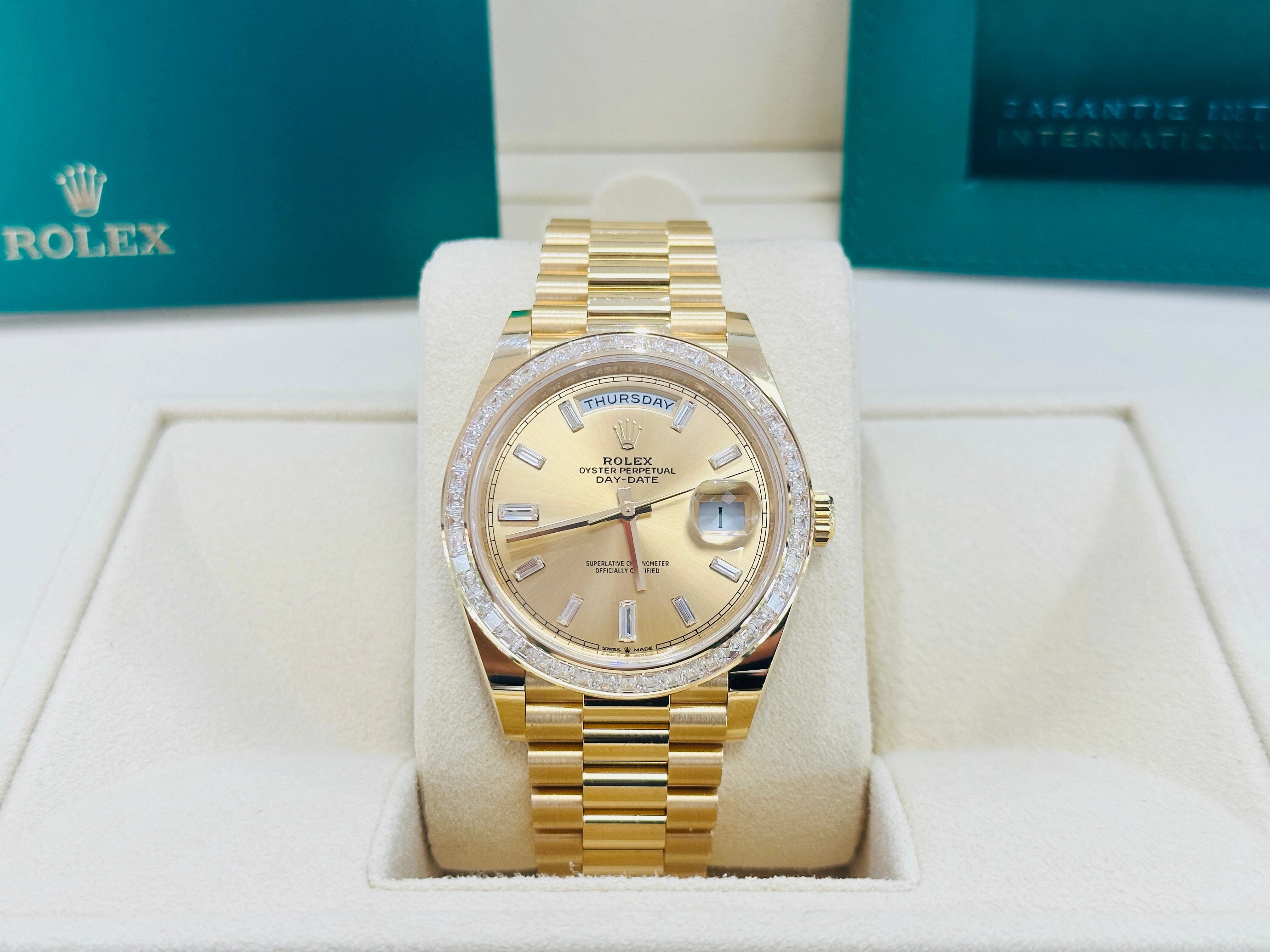 Rolex Day-Date 40 Yellow Gold Baguette Yellow gold Bezel  Factory Baguette Diamond Champagne Dial 228398TBR Box and Papers