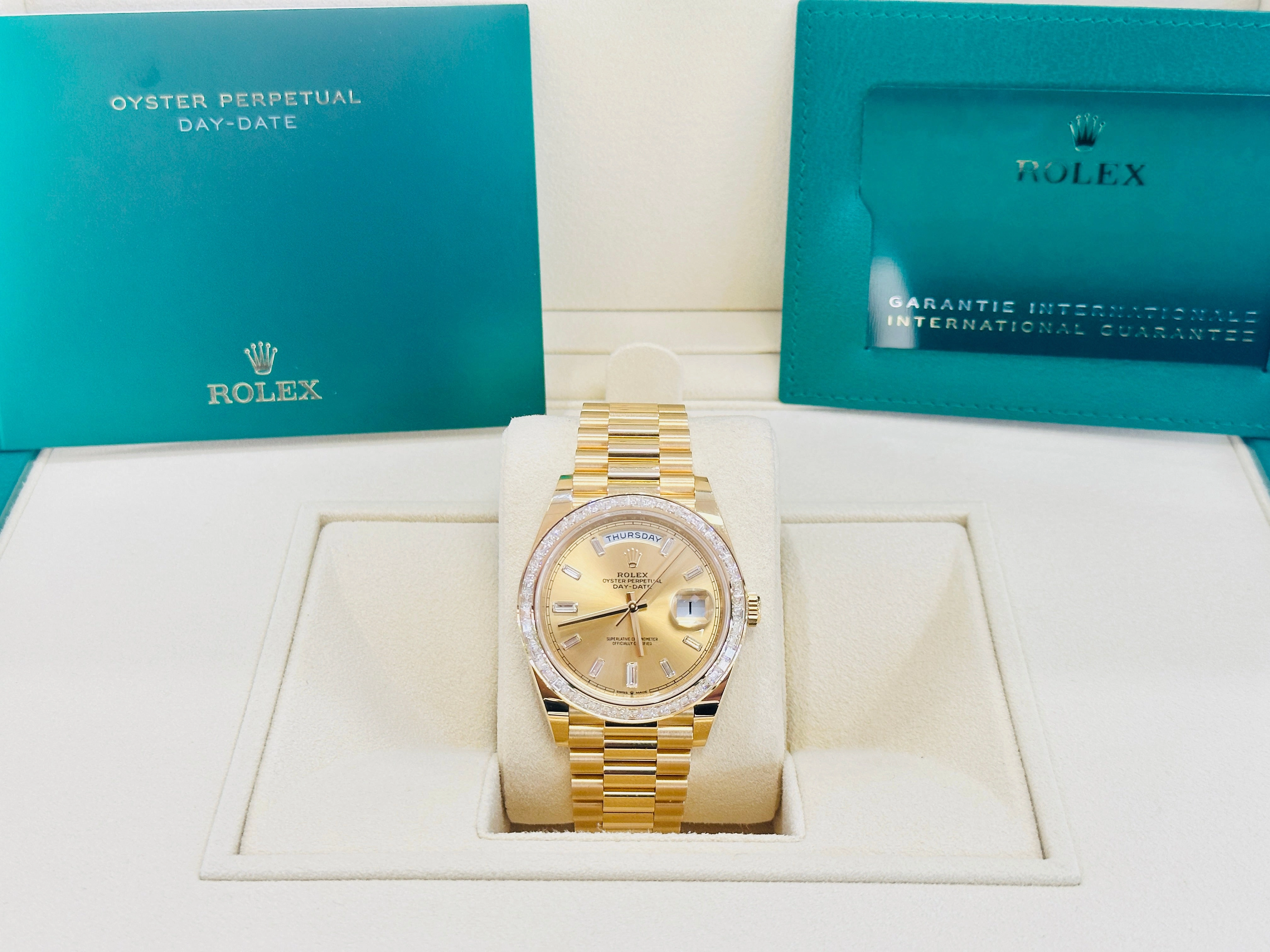 Rolex Day-Date 40 Yellow Gold Baguette Yellow gold Bezel  Factory Baguette Diamond Champagne Dial 228398TBR Box and Papers