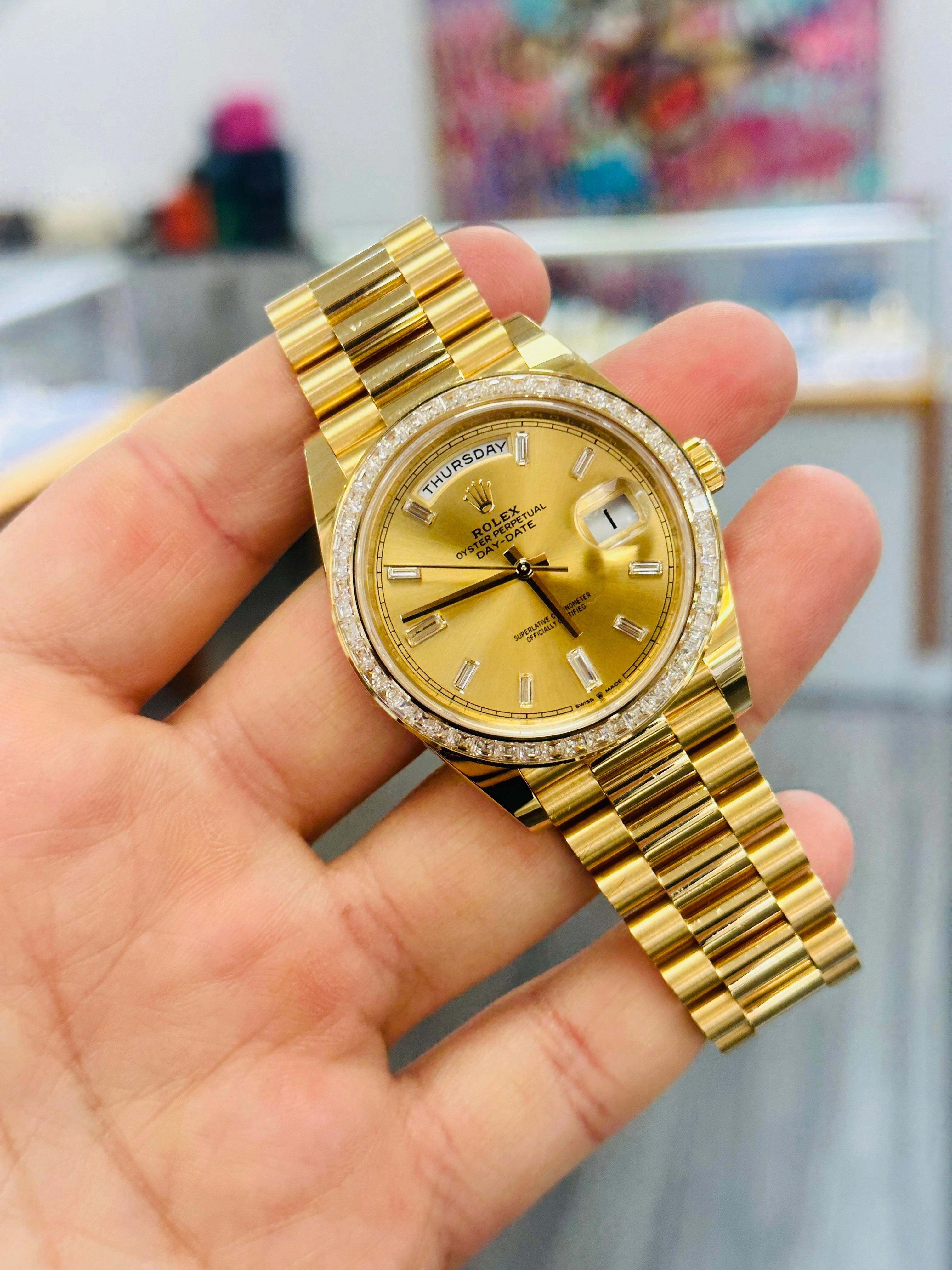 Rolex Day-Date 40 Yellow Gold Baguette Yellow gold Bezel  Factory Baguette Diamond Champagne Dial 228398TBR Box and Papers