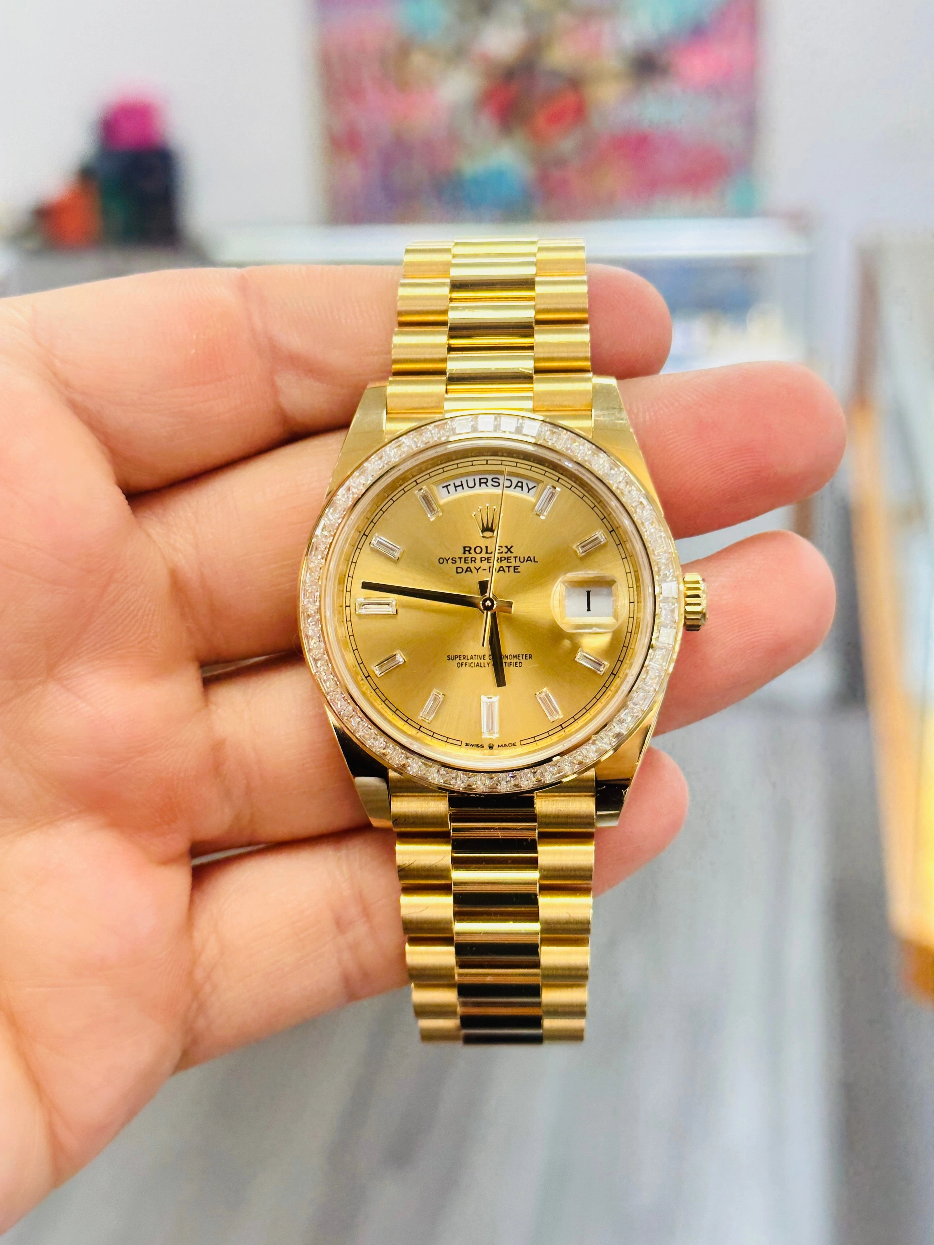 Rolex Day-Date 40 Yellow Gold Baguette Yellow gold Bezel  Factory Baguette Diamond Champagne Dial 228398TBR Box and Papers
