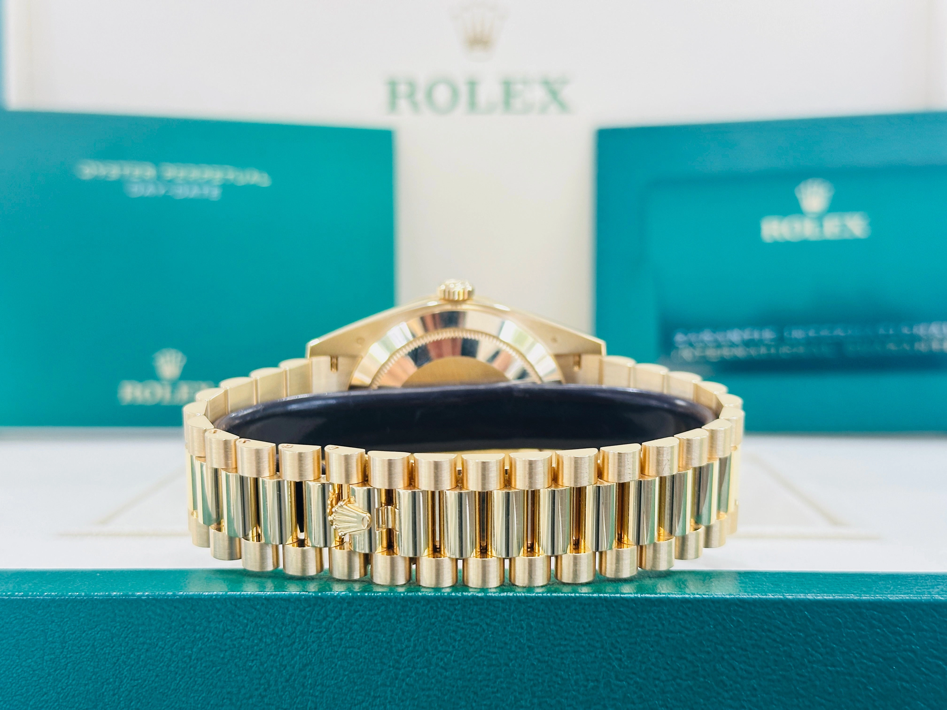 Rolex Day-Date 40 Yellow Gold Baguette Yellow gold Bezel  Factory Baguette Diamond Champagne Dial 228398TBR Box and Papers