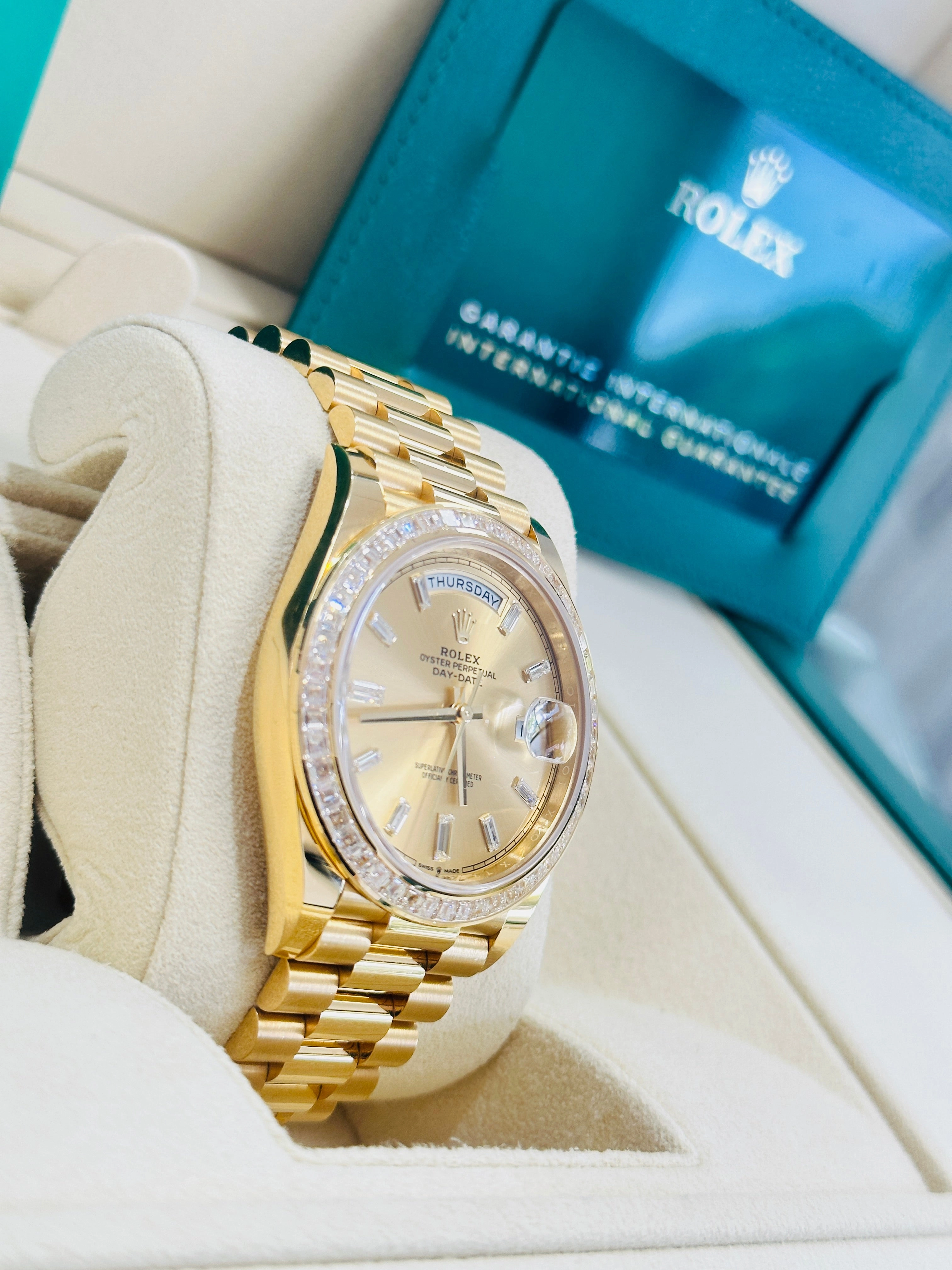 Rolex Day-Date 40 Yellow Gold Baguette Yellow gold Bezel  Factory Baguette Diamond Champagne Dial 228398TBR Box and Papers