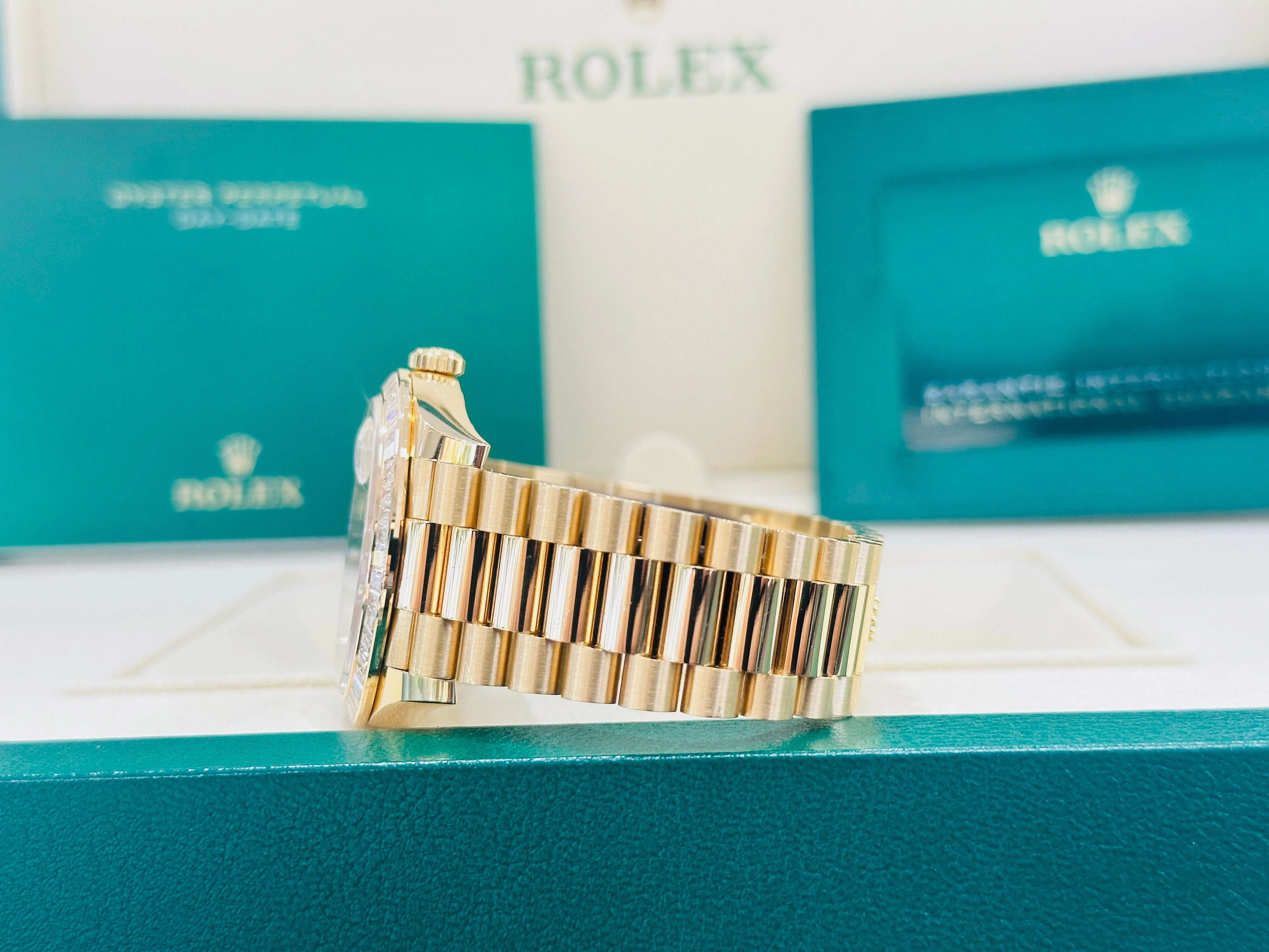 Rolex Day-Date 40 Yellow Gold Baguette Yellow gold Bezel  Factory Baguette Diamond Champagne Dial 228398TBR Box and Papers