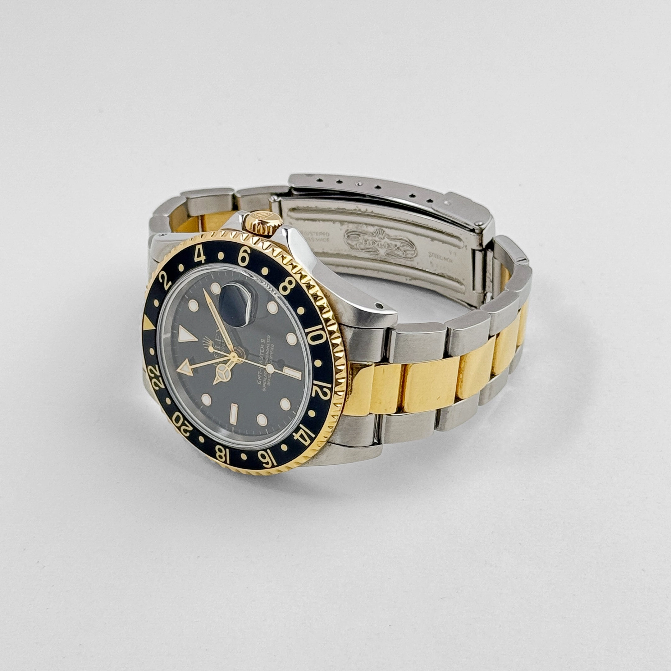 Rolex GMT-Master II 16713 Stainless Steel Yellow Gold Black Dial (1997)