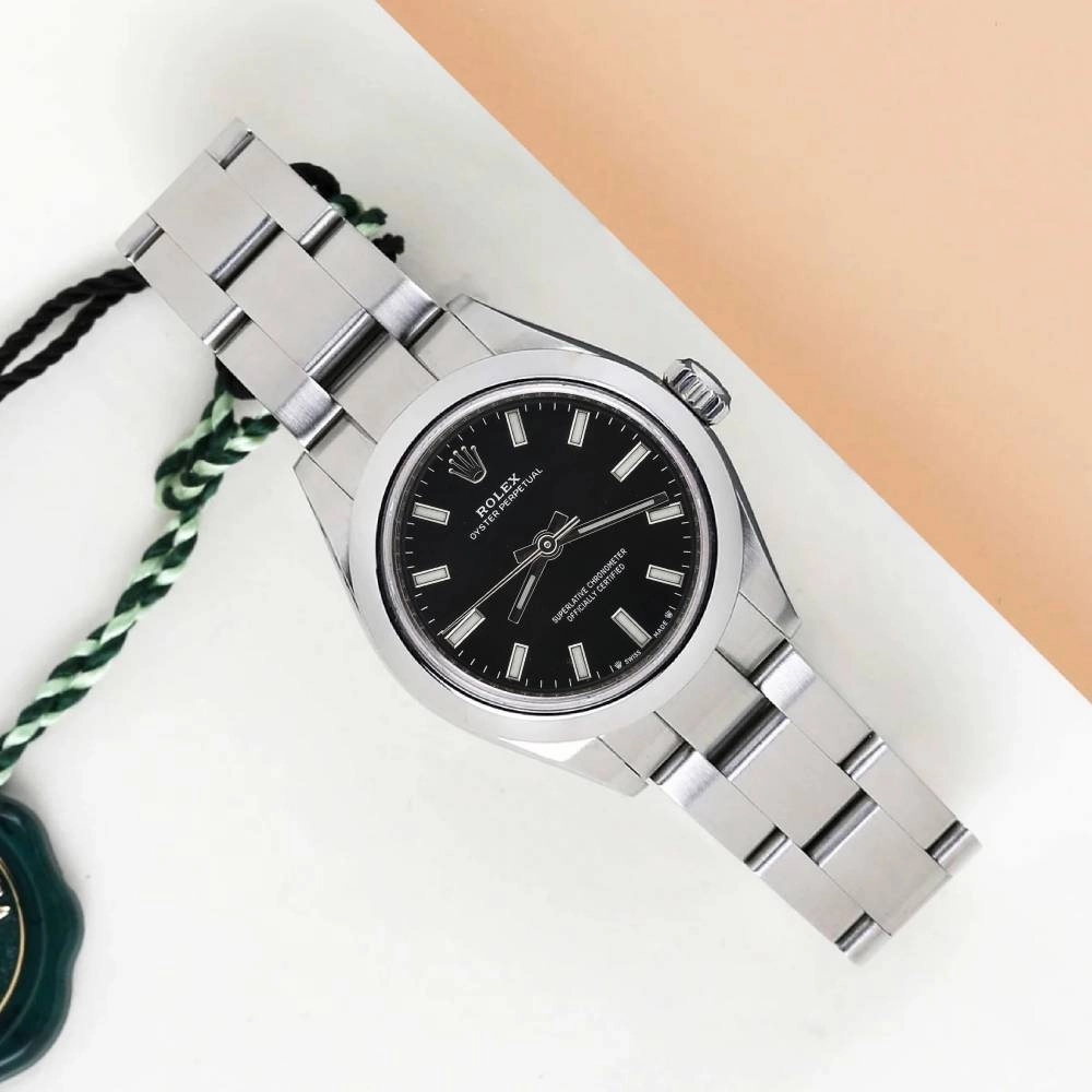 Rolex Oyster Perpetual 28mm | Stainless steel bracelet | Bright black dial Smooth bezel | Ladies Watch 276200-0002